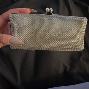 bebe Shimmering Silver Clutch